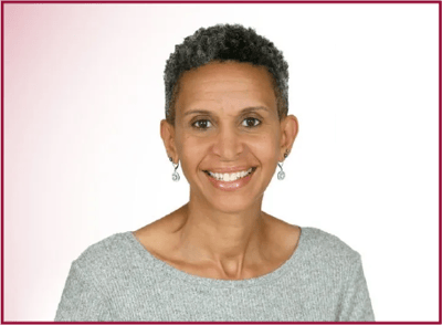 Avery Heights Assisted Living and Memory Care, independent living in Hartford, CT — Smiling woman with short hair and earrings