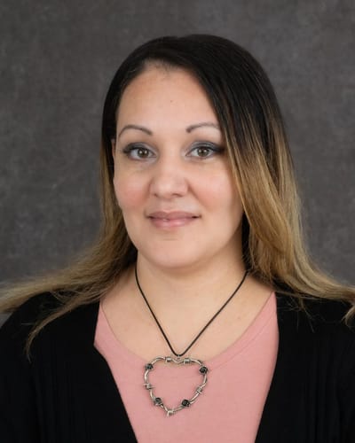 Avery Heights Assisted Living and Memory Care, independent living in Hartford, CT — Woman with long hair wearing a heart-shaped necklace