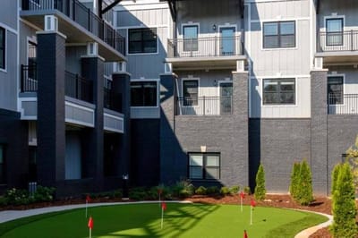 Outdoor green space with mini-golf and balconies