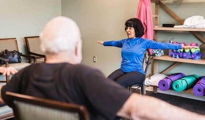 Residents participating in a gentle exercise class