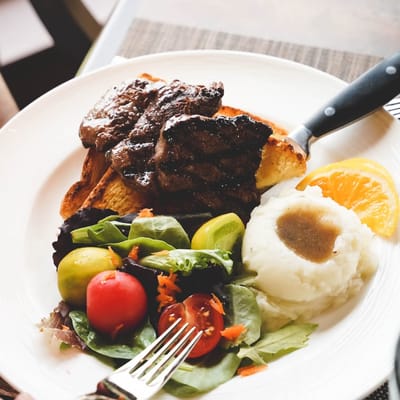 Meadowcrest – Middletown, Assisted Living in Middletown, DE — A plate of steak, mashed potatoes, and salad