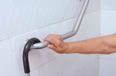 Meadowcrest – Middletown, Assisted Living in Middletown, DE — Close-up of a hand gripping a grab bar in a bathroom