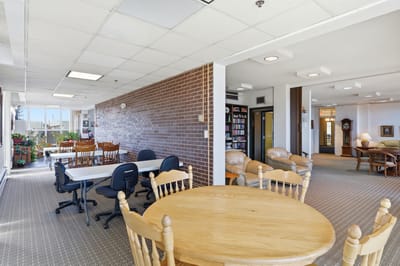 Bright common area with tables and chairs