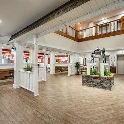 Bright lobby area with seating and greenery