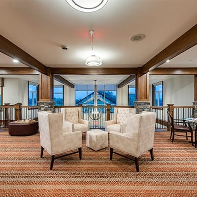 Well-furnished lounge area in a senior living facility