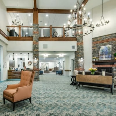 Bright and welcoming lobby area with residents and staff