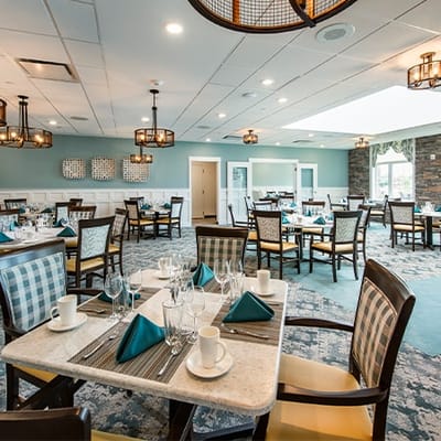 Bright dining room with elegant table settings