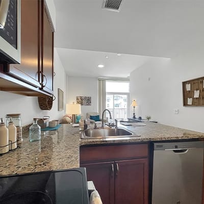 Bright kitchen area in a senior living unit