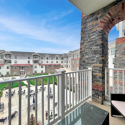View of the outdoor space and building from a balcony