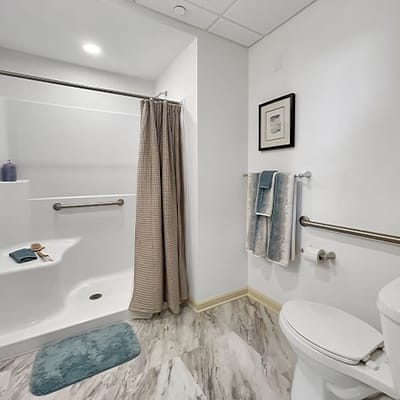 Bright and clean bathroom with safety features
