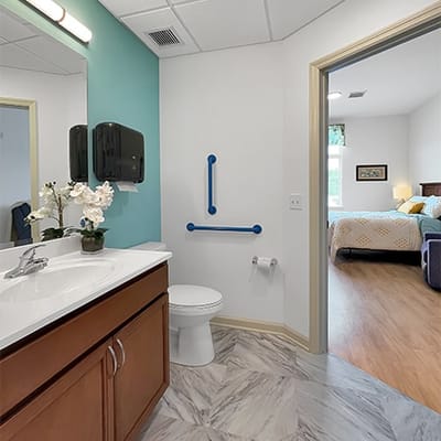A clean, well-equipped bathroom in a resident room