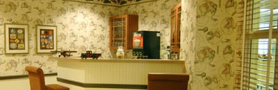 Interior view of a cozy common area with vintage decor