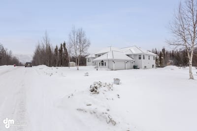 Exterior view of a house in a snowy landscape