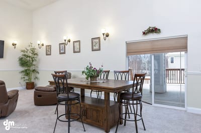 Bright common area with seating and decor