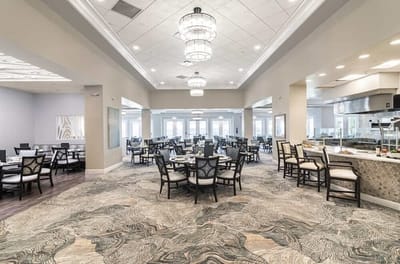Bright dining room with tables and chairs