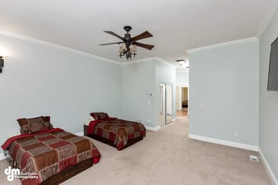 Bright interior of a private resident room with two beds