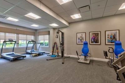 Fully equipped fitness room with exercise machines