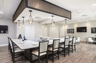 Bright common area with a large countertop and seating