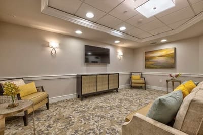 Cozy common area with seating and artwork