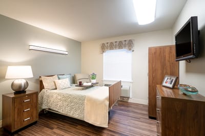 Cozy resident room with a bed and decor