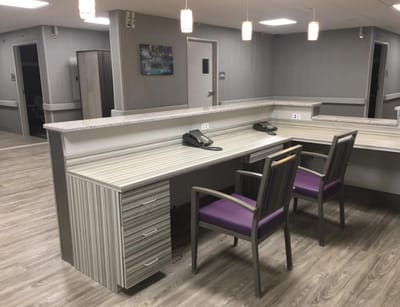 Interior reception area with seating and desk