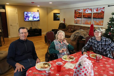 Residents enjoying a meal together in a dining area