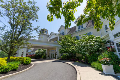 Exterior view of Van Dyk Park Place with landscaping