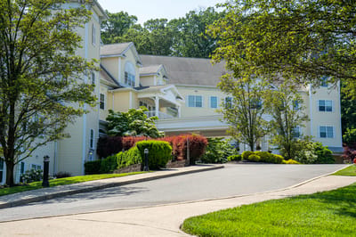 Exterior view of Van Dyk Park Place with landscaping