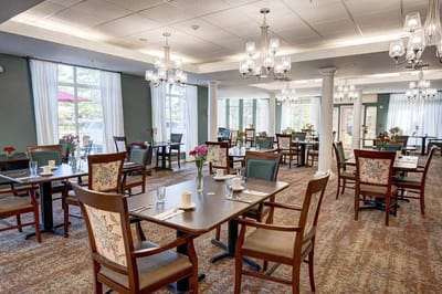 Dining area with tables set for meals