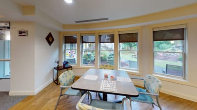Interior view of a common area with a bingo game setup