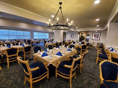 Dining room with tables set for a meal