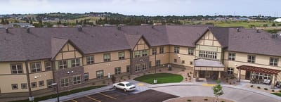 Aerial view of the facility's exterior and entrance area