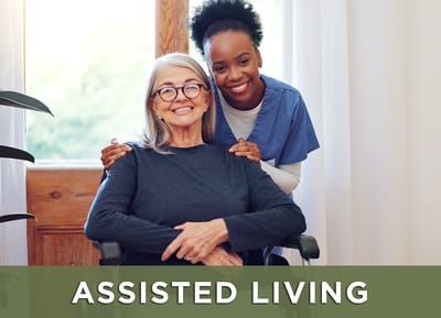 A caregiver with a resident in a bright indoor setting
