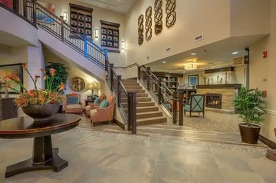 Interior view of a comfortable living area with stairs
