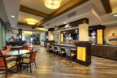 Common area in a senior living facility with seating and decor