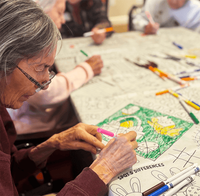 Residents engaged in an arts and crafts activity