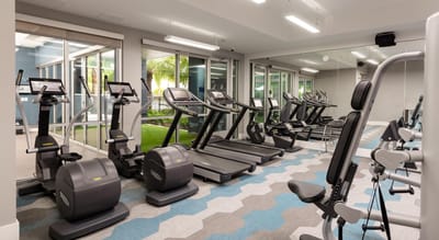 Interior view of a modern gym with exercise equipment