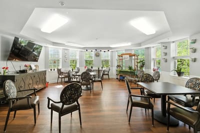 Bright common area with tables and chairs