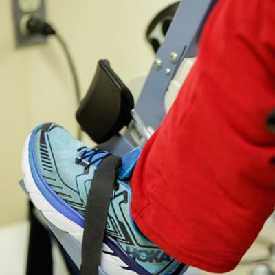 Close-up of a foot in a gym setting