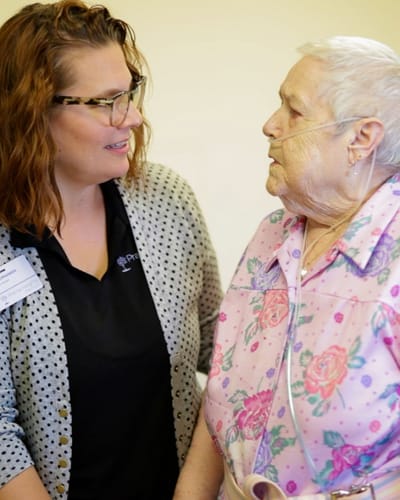 Staff member engaging with a resident