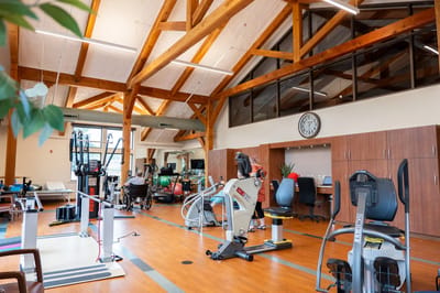 Interior view of a fitness room with exercise equipment