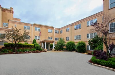 Exterior view of Oak Hill Center with landscaped entrance