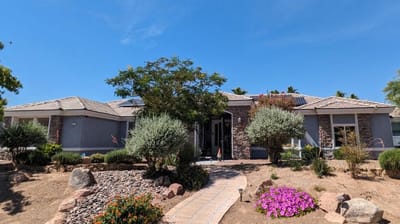 Exterior view of Mother‘s Touch Senior Home with landscaped yard