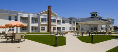 Outdoor seating area with well-maintained landscape