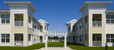 Exterior view of a senior living facility with shared spaces