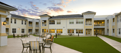 Outdoor courtyard area with seating and landscaping