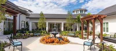 Beautiful outdoor courtyard with a fountain and seating