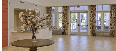 Bright and welcoming lobby area with floral decor