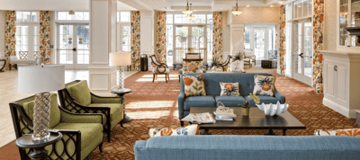 Bright and welcoming common area with floral decor