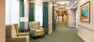 Interior view of a hallway with seating area